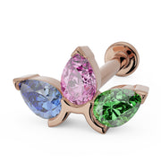 14K rose gold flat back stud with flower-inspired trio of pear-cut sapphire, tanzanite, and garnet gems