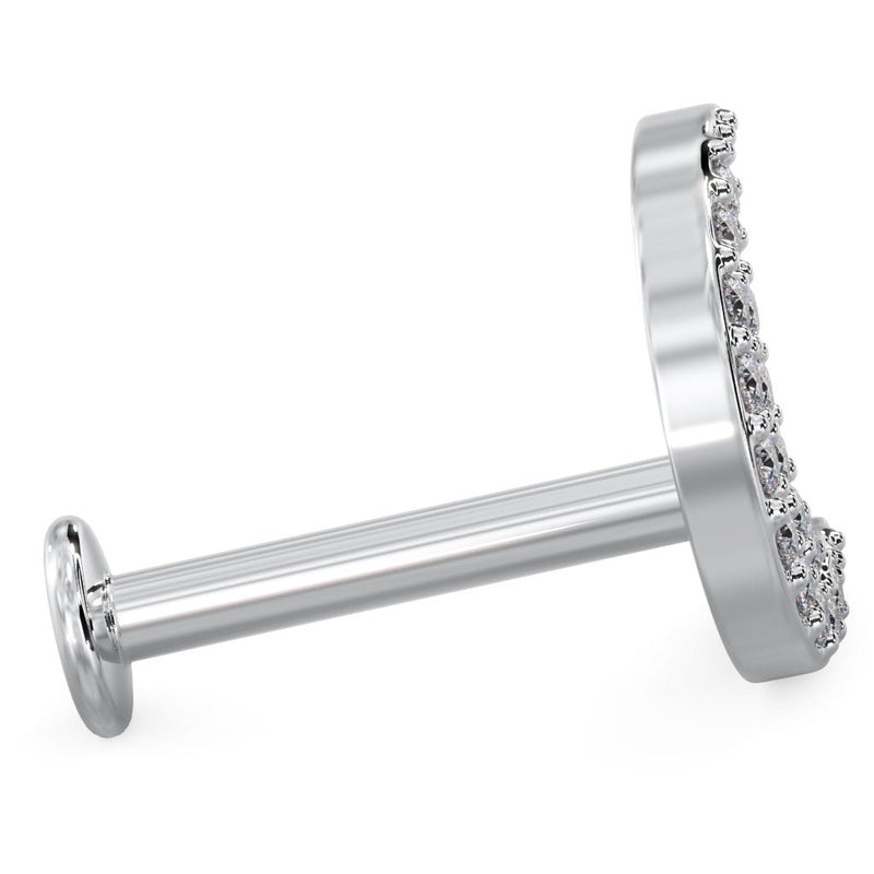Side profile of white gold diamond moon labret stud showing flat back post and disc backing