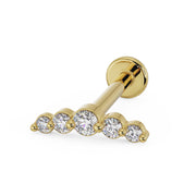 14K yellow gold mini climber cartilage earring with 5 CZ stones in graduated sizes, angled view
