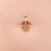 14k rose gold lotus flower navel ring shown in belly button piercing for fit and scale reference