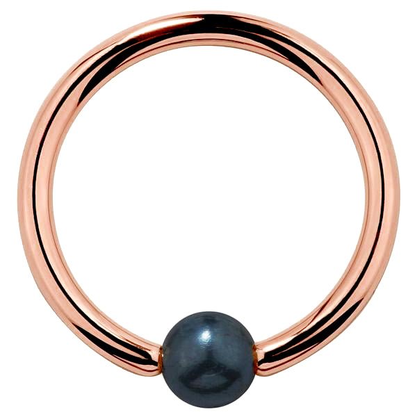 14K rose gold captive bead ring with blue-green iridescent peacock pearl, front view