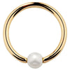 14K yellow gold captive bead ring with cultured pearl, polished hoop front view