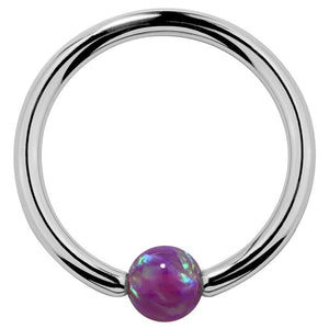 14K white gold captive bead ring with purple opal bead, polished silver-tone hoop front view