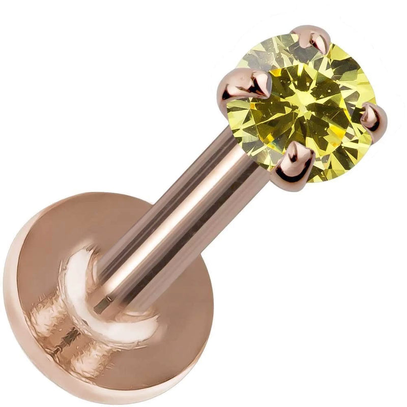 2mm citrine prong set flat back labret in 14K rose gold, angled view showing warm pink metal contrast