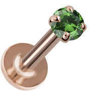 3mm emerald prong-set flat back labret in 14K rose gold, angled view highlighting warm rose tone setting