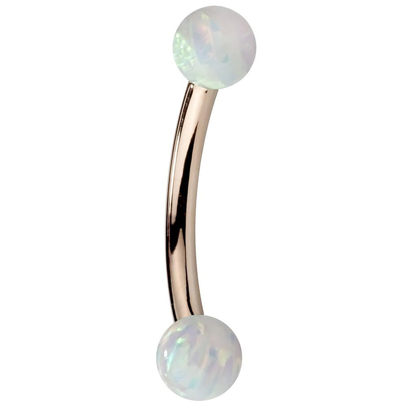 14K rose gold curved barbell with simulated opal balls showing warm pink-gold tone