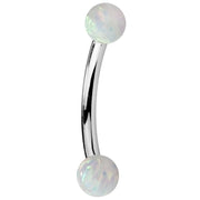 14K white gold curved barbell with white simulated opal ends, polished silver-tone finish