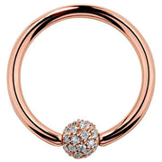 14K rose gold fixed bead ring with 4mm diamond pavé ball, front view showing warm-toned hoop