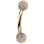 14K yellow gold curved barbell with diamond pavé 5mm balls, side view showing warm gold tone