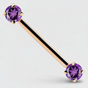 14K rose gold straight barbell with dual round purple CZ stones in 4-prong settings, angled view