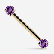 14K yellow gold straight barbell with dual purple CZ prong settings, angled product view