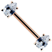 14k rose gold straight nipple barbell with two pear-cut CZ prong ends, white background angled view