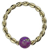 14K yellow gold twisted captive bead ring with purple opal bead, front view on white background