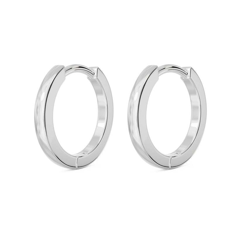 Pair of 14k white gold 10mm huggie hoop earrings shown together, polished silver-toned finish