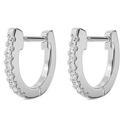 14k white gold diamond huggie hoop earrings pair, front view showing prong-set diamonds along outer arc