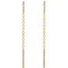 Close-up of 14k yellow gold diamond chain dangle earrings highlighting pavé bar and chain detail