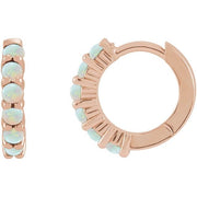 14k rose gold opal huggie hoop earrings showing front and side profile views