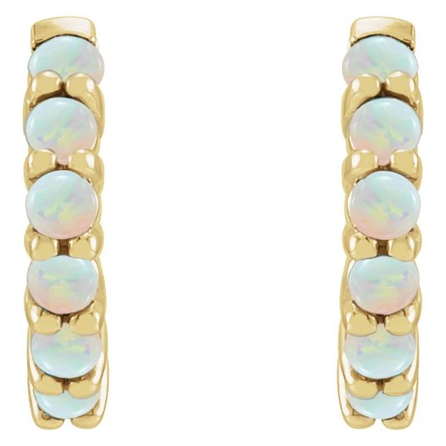 Close-up front view of 14k yellow gold huggie hoops showing paired opal stone detail and prong setting