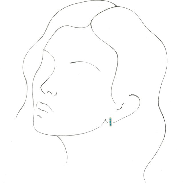 Line illustration showing opal huggie hoop earring fit and scale on a pierced earlobe