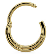 Large 14k yellow gold two-band clicker ring shown open, displaying wide hinged clicker closure