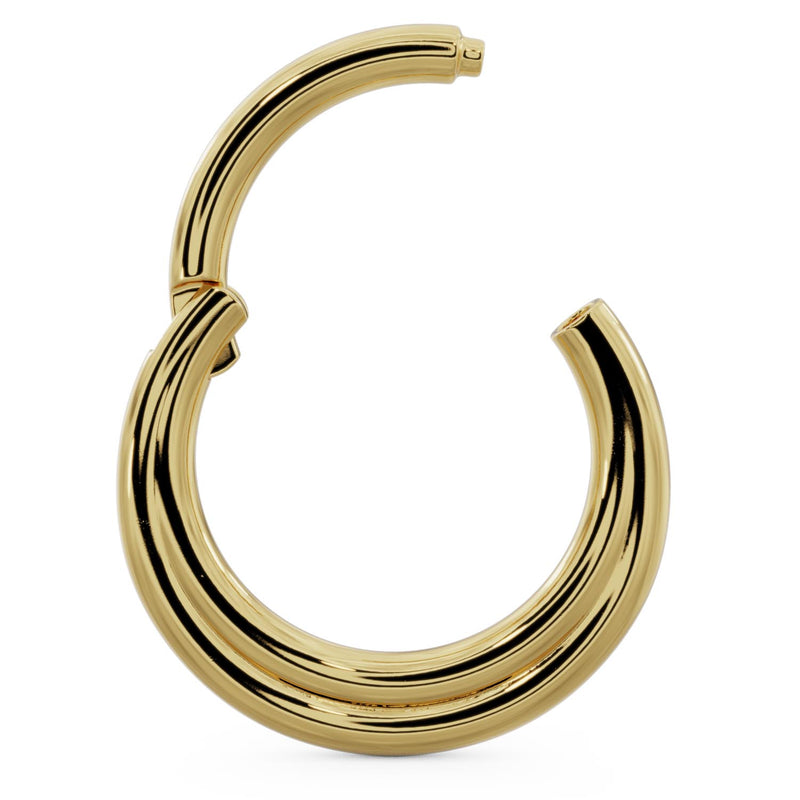 14k yellow gold two-band clicker ring shown open, revealing hinged clicker closure mechanism