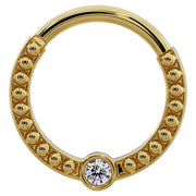 Larger diameter 14k yellow gold diamond dome bead clicker ring, flat front view showing wider hoop