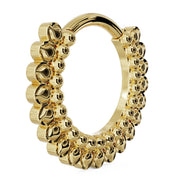 Angled side view of 14k yellow gold petal clicker hoop showing ring thickness and petal layers