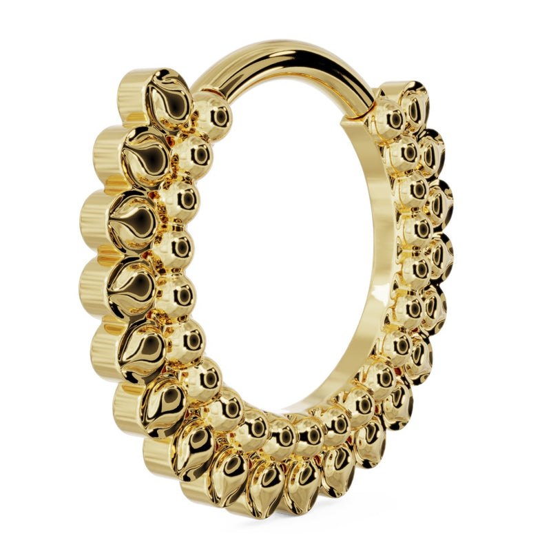 Angled side view of 14k yellow gold petal clicker hoop showing ring thickness and petal layers