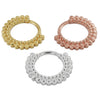 Yellow gold, rose gold, and white gold 14k petal clicker hoops shown together, larger size comparison