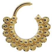 14k yellow gold petal clicker ring shown open, revealing clicker hinge mechanism