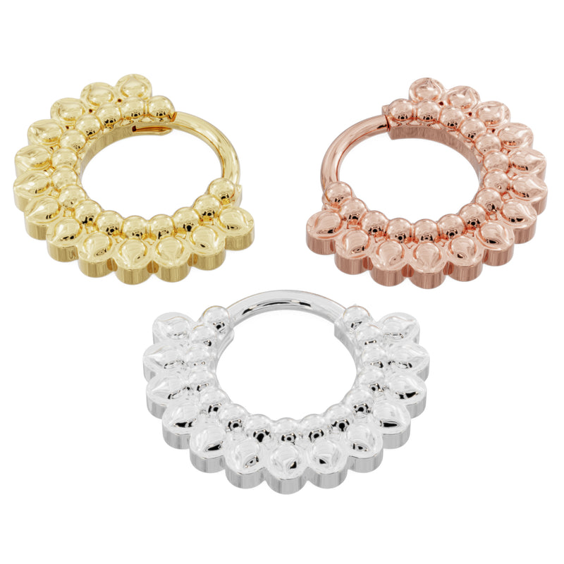 All three metal options of the petal clicker hoop: 14k yellow gold, rose gold, and white gold