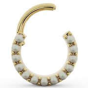 14k yellow gold pearl clicker ring shown open, revealing hinged clicker closure mechanism