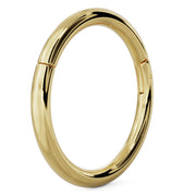Side-angled view of 14k yellow gold plain clicker ring hoop showing polished high-gloss finish