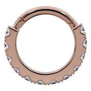 Front-facing view of 14k rose gold CZ infinity clicker ring with CZ stones bordering the hoop edge