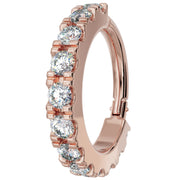 14k rose gold CZ infinity clicker ring, angled side view highlighting warm gold tone and CZ settings