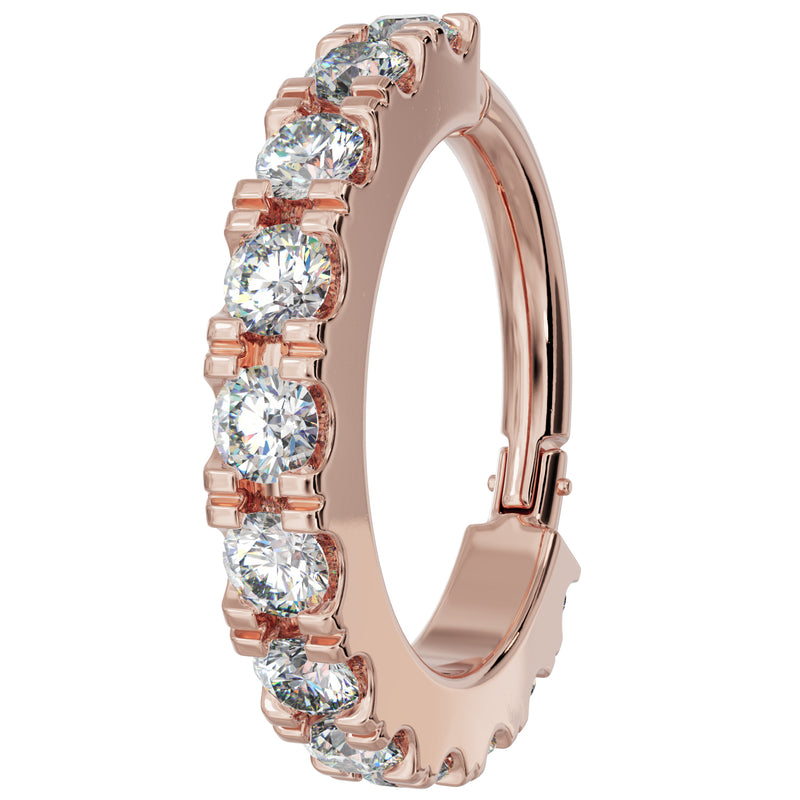 14k rose gold CZ infinity clicker ring, angled side view highlighting warm gold tone and CZ settings