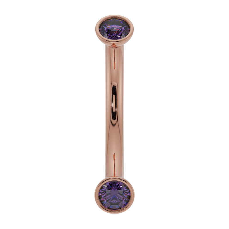 14k rose gold curved barbell featuring dual bezel-set round amethyst stones