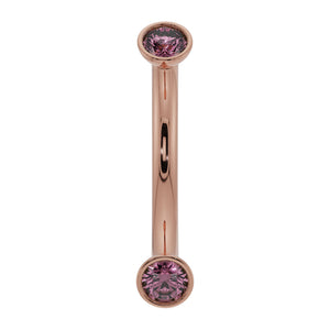 14K rose gold pink sapphire bezel-set curved barbell, front view showing warm blush tone