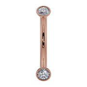 14k rose gold diamond bezel-set curved barbell with sparkling round diamonds, front view