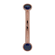 14k rose gold curved barbell with dual bezel-set blue sapphires, front view