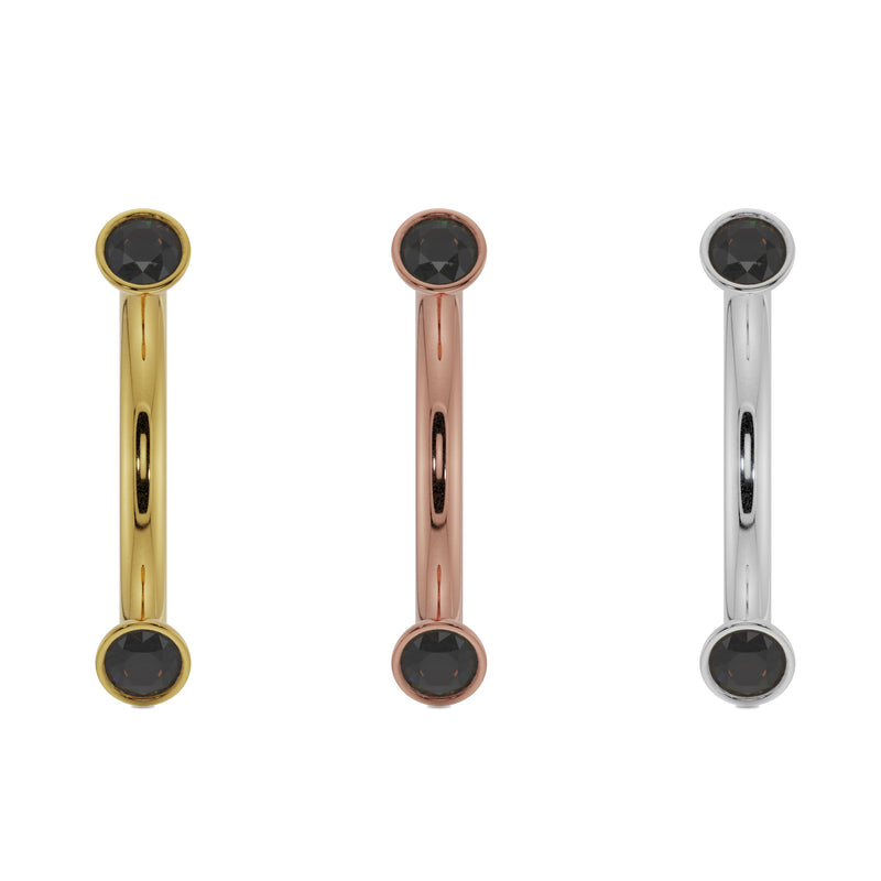Black diamond bezel curved barbell in all three 14k gold options: yellow, rose, and white