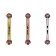 Pink sapphire bezel curved barbell in 14K yellow gold, rose gold, and white gold side by side