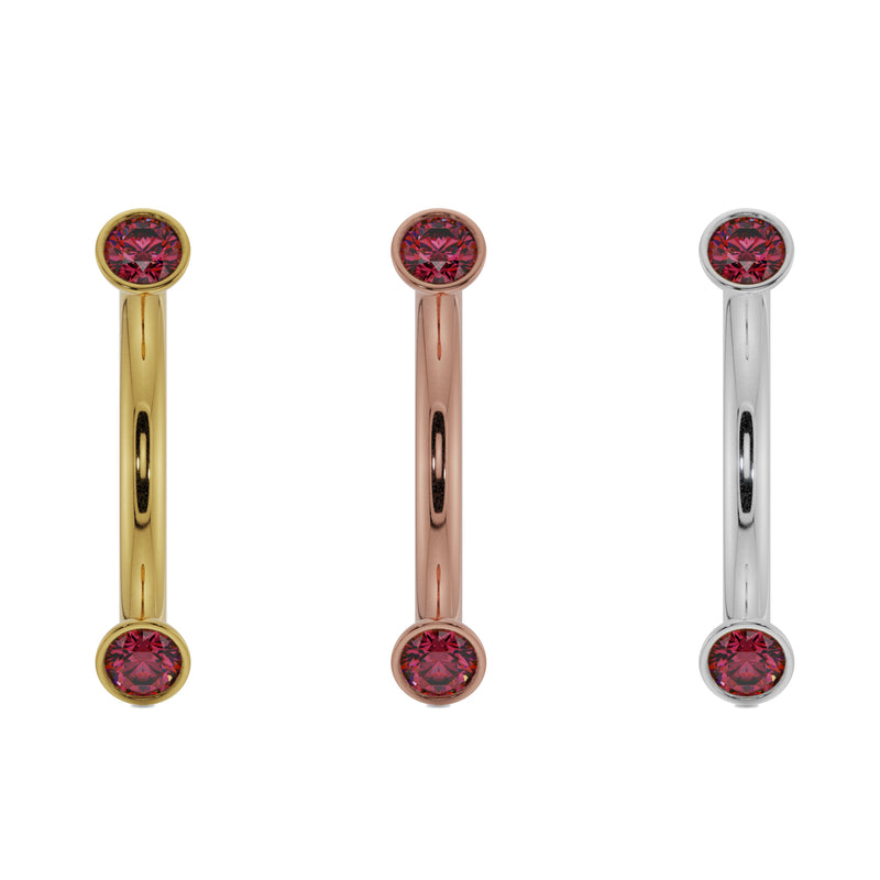 Ruby bezel curved barbell in all three 14k gold colors: yellow, rose, and white gold side by side