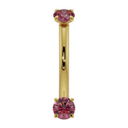 14k yellow gold ruby curved barbell with dual prong-set rubies, straight-on front view