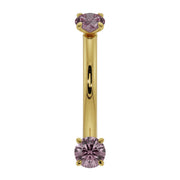 14k yellow gold dual pink sapphire curved barbell, straight-on front view with assembled ends
