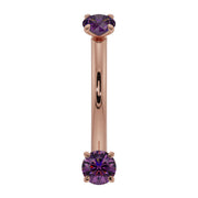 14K rose gold amethyst curved barbell with dual prong-set purple stones, front view