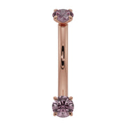 14k rose gold pink sapphire prong-set curved barbell, front view with warm pink-gold bar