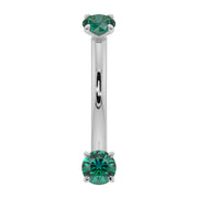 14K white gold dainty emerald curved barbell with dual prong-set round emeralds, front view
