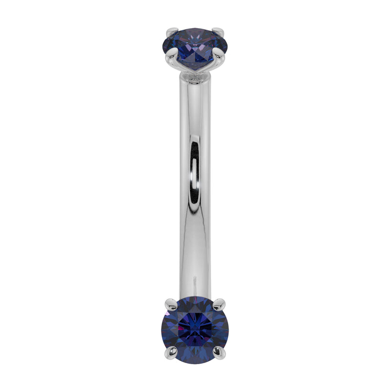 14K white gold blue sapphire curved barbell, front view highlighting cool-toned metal contrast