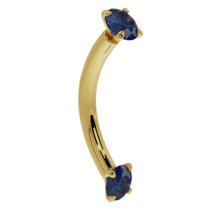 14K yellow gold blue sapphire curved barbell, side profile showing gentle curve and prong-set ends